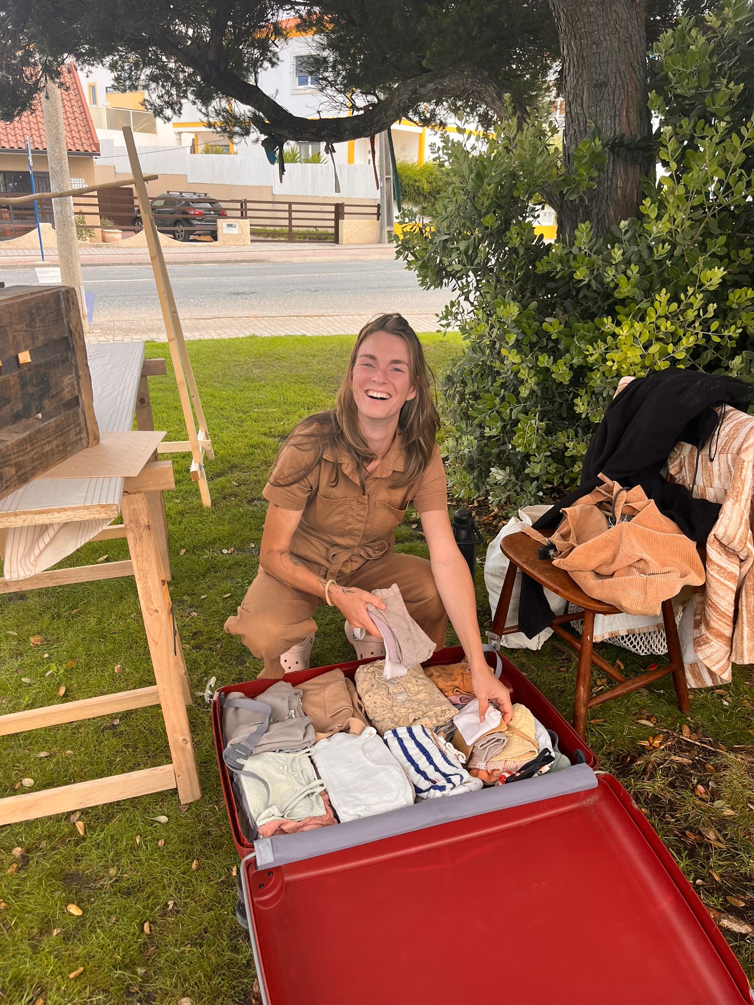 Amber, founder setting up for market