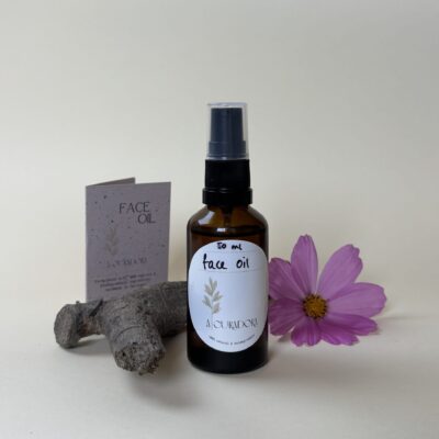 Face oil with information card